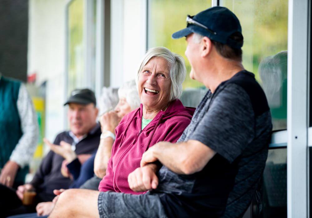 Woman and friend laughing